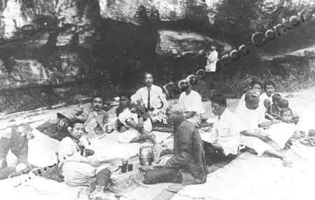 Tanaka and group at waterfall